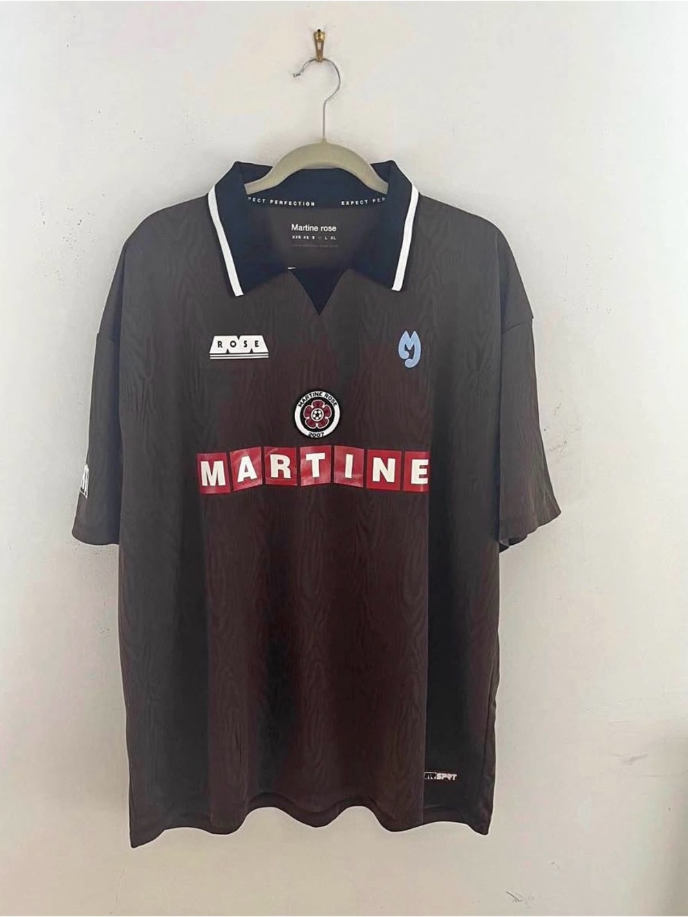 Martine Rose Black Polo Shirt with Red Chest Branding